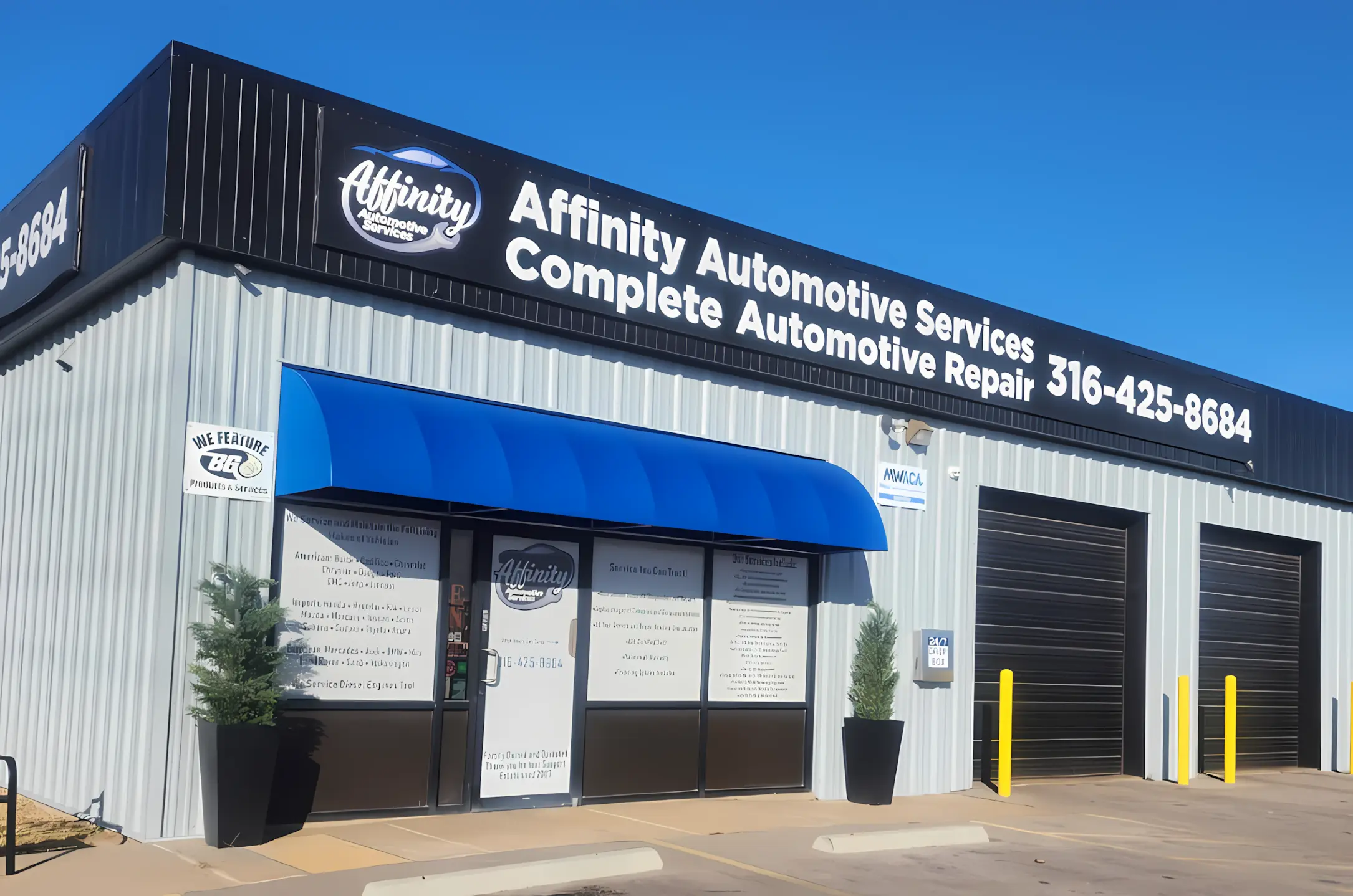 Affinity Automotive Services building with a blue awning, large windows, and signage displaying the business name, phone number, and “Complete Automotive Repair.” Two small trees in pots are by the entrance.